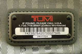 authorized Tumi distributor or representative or affiliated with Tumi 