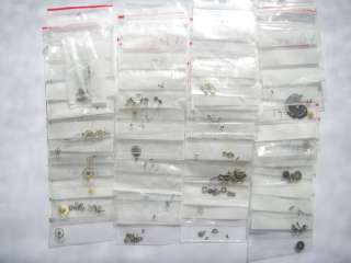 Lot of 30 zip bags with different caliber watch parts  