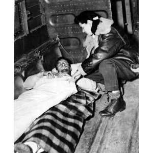   Flight Nurse & Airman During a Medical Evacuation in China Circa 1944