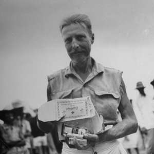 Freed American Pow Holding Red Cross Supplies after His Release from a 