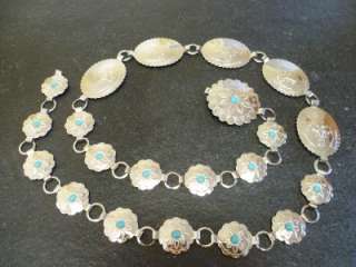   Silver Concho and Turquoise Metal Belt adjusts up to 40  