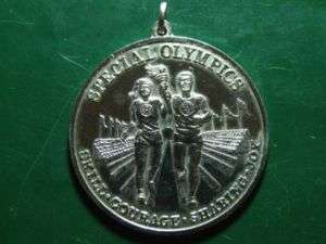Special Olympic torch runner medal  