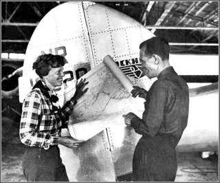 Photo Amelia Earhart & Fred Noonan Inspect Map  