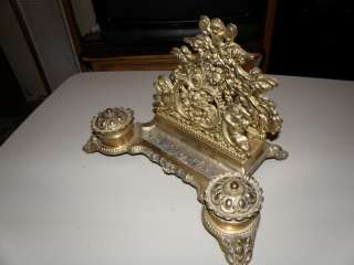 Ornate Victorian style brass letter stand with double ink well and pen 