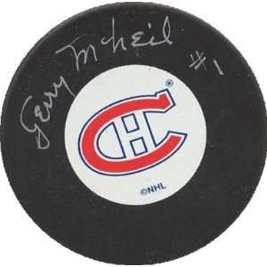  Gerry McNeil Autographed Puck   )