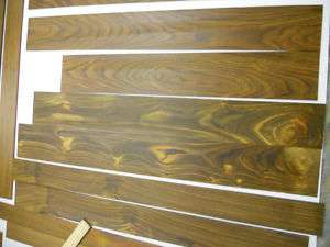 39 pieces of finely sanded cocobolo rosewood veneer  