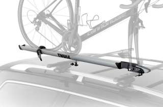 The Thule Echelon Fork Mount Rooftop Bicycle Carrier mounted on a car 
