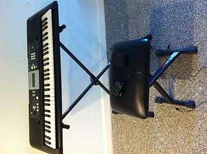 Yamaha keyboard with stand and bench  