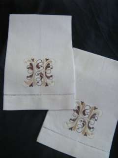 offer apair of embroidered 100% white linen hemstitched hand towels 
