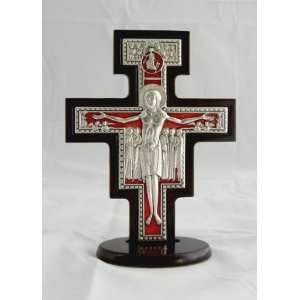 San Damian crucifix, stands/hangs, silver metal w/red trim w/wood edge 
